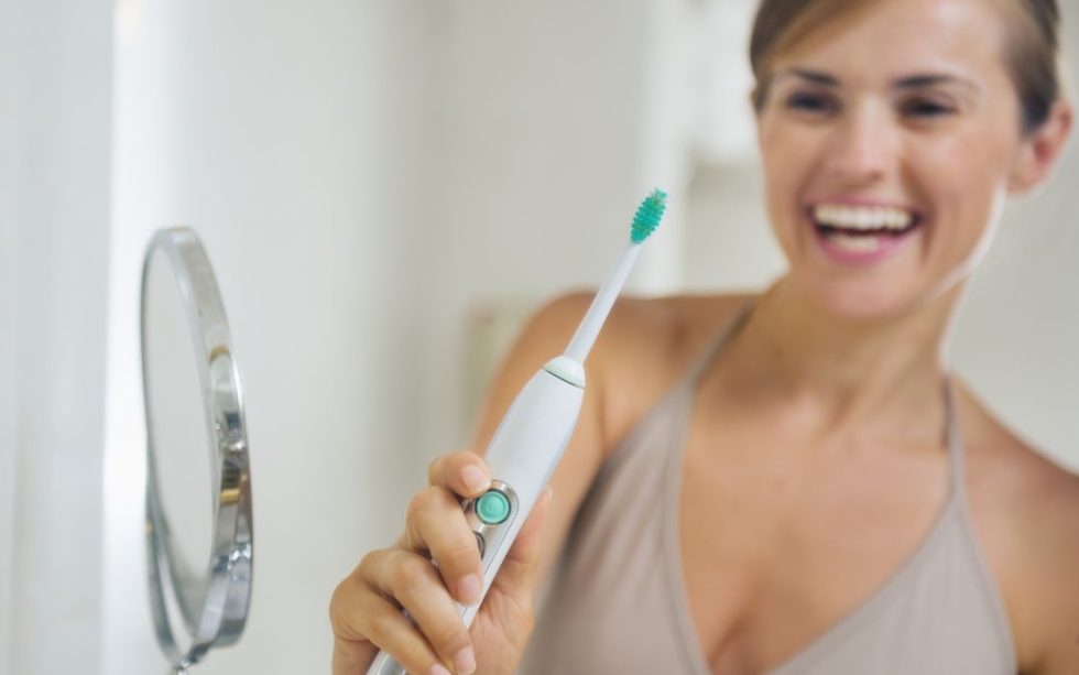 Dental Implants and Electric Toothbrushes